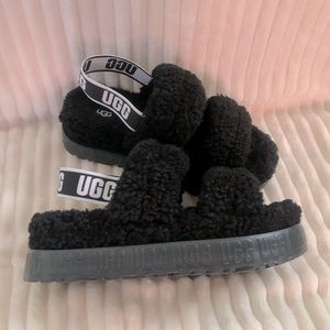 Black lamb UGG sandals